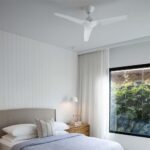 Infinity-iD white ceiling fan in bedroom