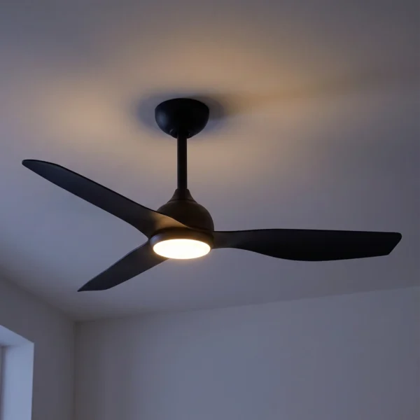 claro-whisper-dc-48-inch-ceiling-fan-black-with-led-light-on-close-up-on-dark-background