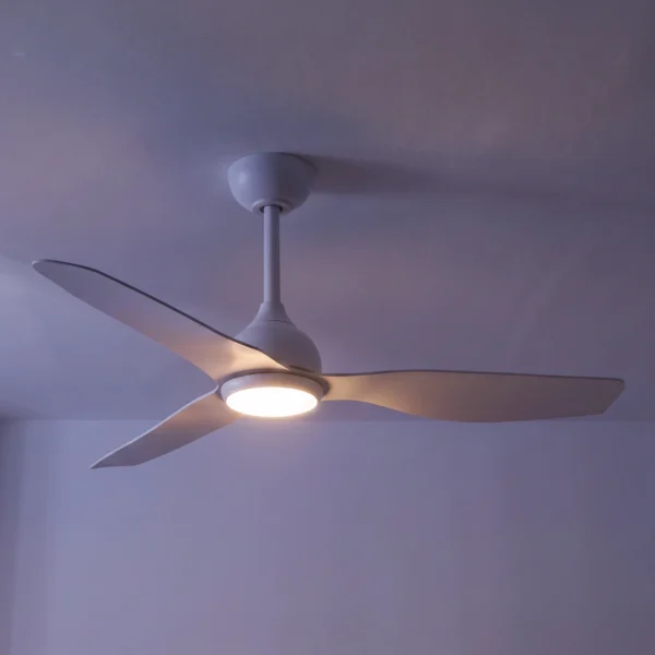 claro-whisper-dc-ceiling-fan-white-with-led-light-on-dark-barkground-close-up