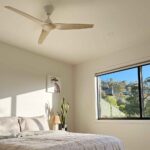 Fanco Infinity-iD SMART DC Ceiling Fan (White with Beechwood Blades) in bedroom
