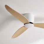 claro-essentials-spirit-dc-ceiling-fan-no-light-white-with-timber-style-blades-close-up-angled-insitu