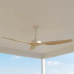 whisper-ip66-58-inch-white-with-light-oak-blades-no-light-installed-in-covered-outdoor-ceiling